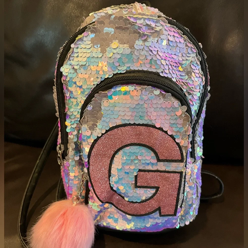 Justice “G” sequin backpack